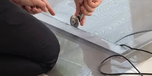 Window screen repair on a residential window