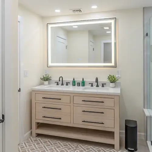Bathroom vanity mirror above a sink